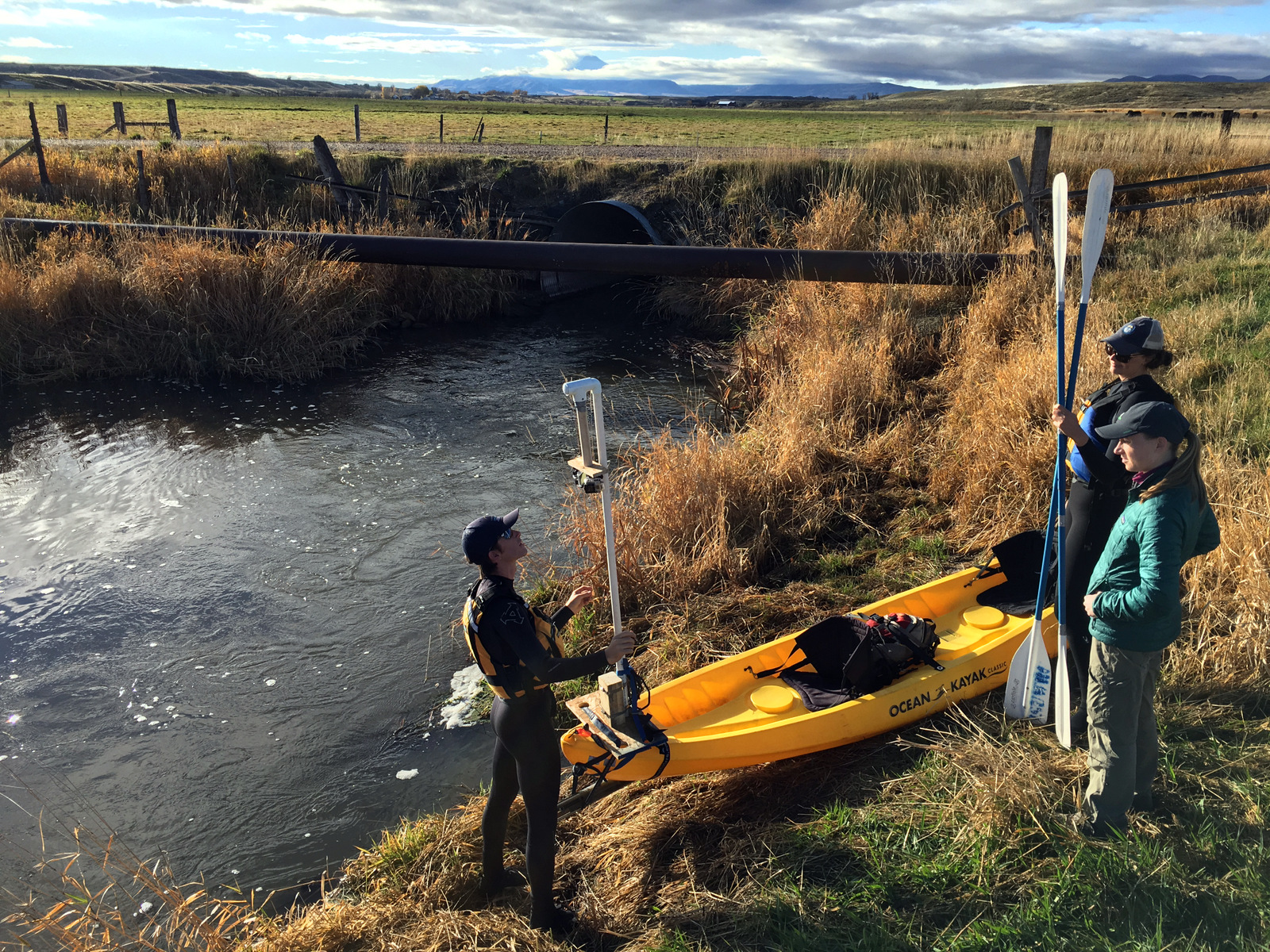 Idaho State University geoscience graduate students prepare sensors and cameras for a Fall 2016 survey of stream conditions on Marsh Creek, a tributary to the Portneuf River in southeast Idaho.