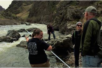 Students collect water samples from Hells Canyon for their research projects. Photo provided by Jenni Light, LCSC 