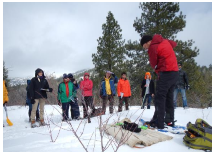Snow Camp organizer Jim McNamara (Boise State Univ) demonstrates collection equipment operation to participants