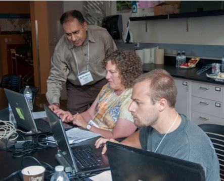 Participants at WVNM work on a project.