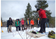 Snow Camp organizer Jim McNamara (Boise State Univ) demonstrates collection equipment operation to participants