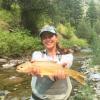 Lizzie holding a Yellowstone Cuttthroat Trout